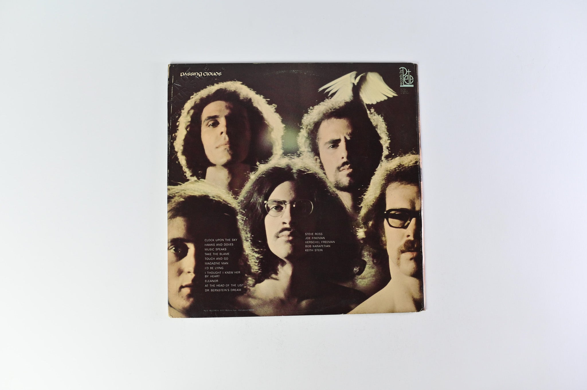 Passing Clouds - Hawks And Doves on Records by Pete