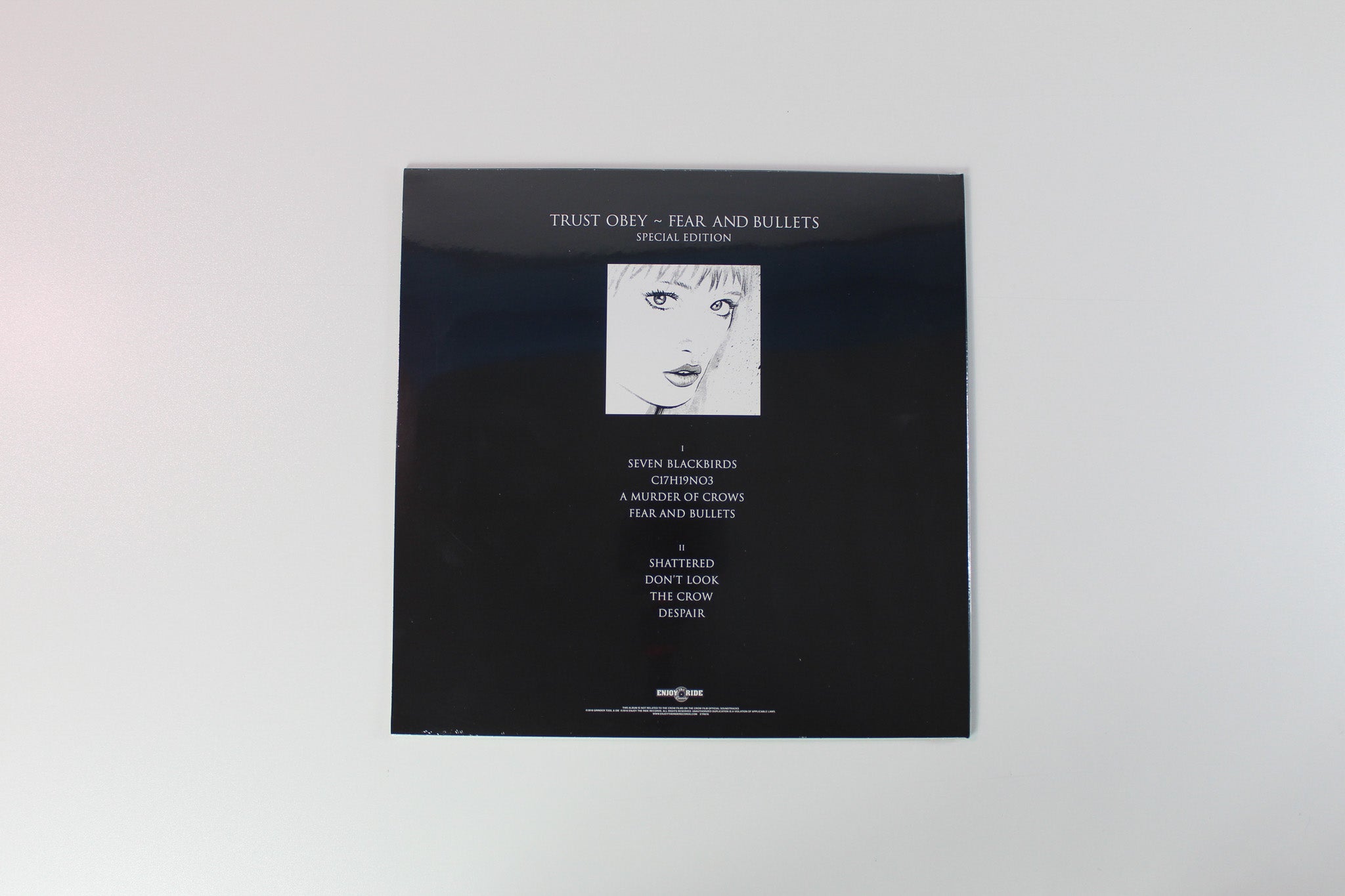 Trust Obey - Fear And Bullets on Enjoy The Ride Ltd Clear With Black Smoke Reissue Sealed
