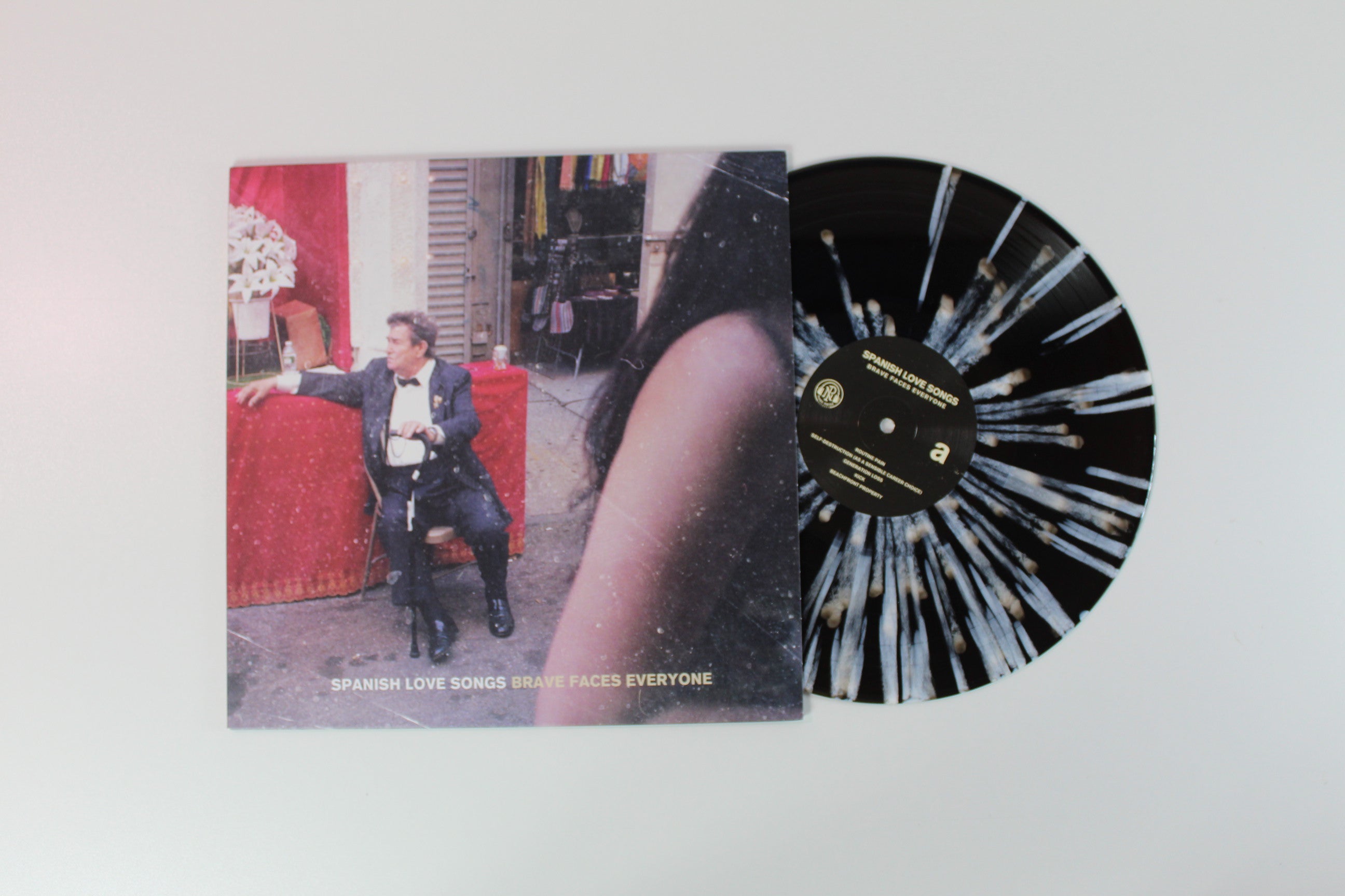 Spanish Love Songs - Brave Faces Everyone on Pure Noise Ltd Black Ice With White Splatter Vinyl Reissue