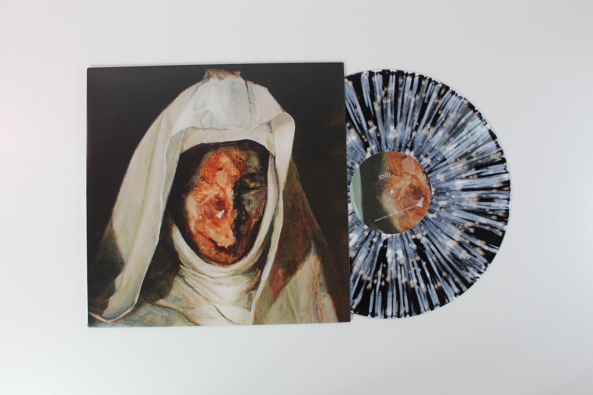 END - From The Unforgiving Arms Of God on Good Fight Music 45 RPM Translucent Black w/ White Splatter Reissue