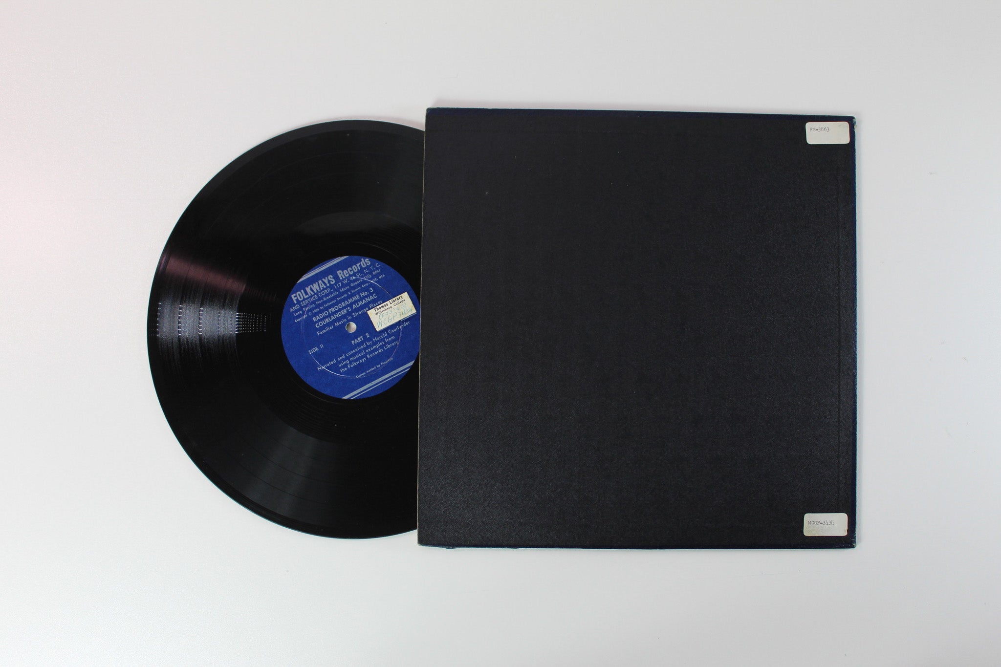 Harold Courlander - Courlander's Almanac: Familiar Music in Strange Places on Folkways Records