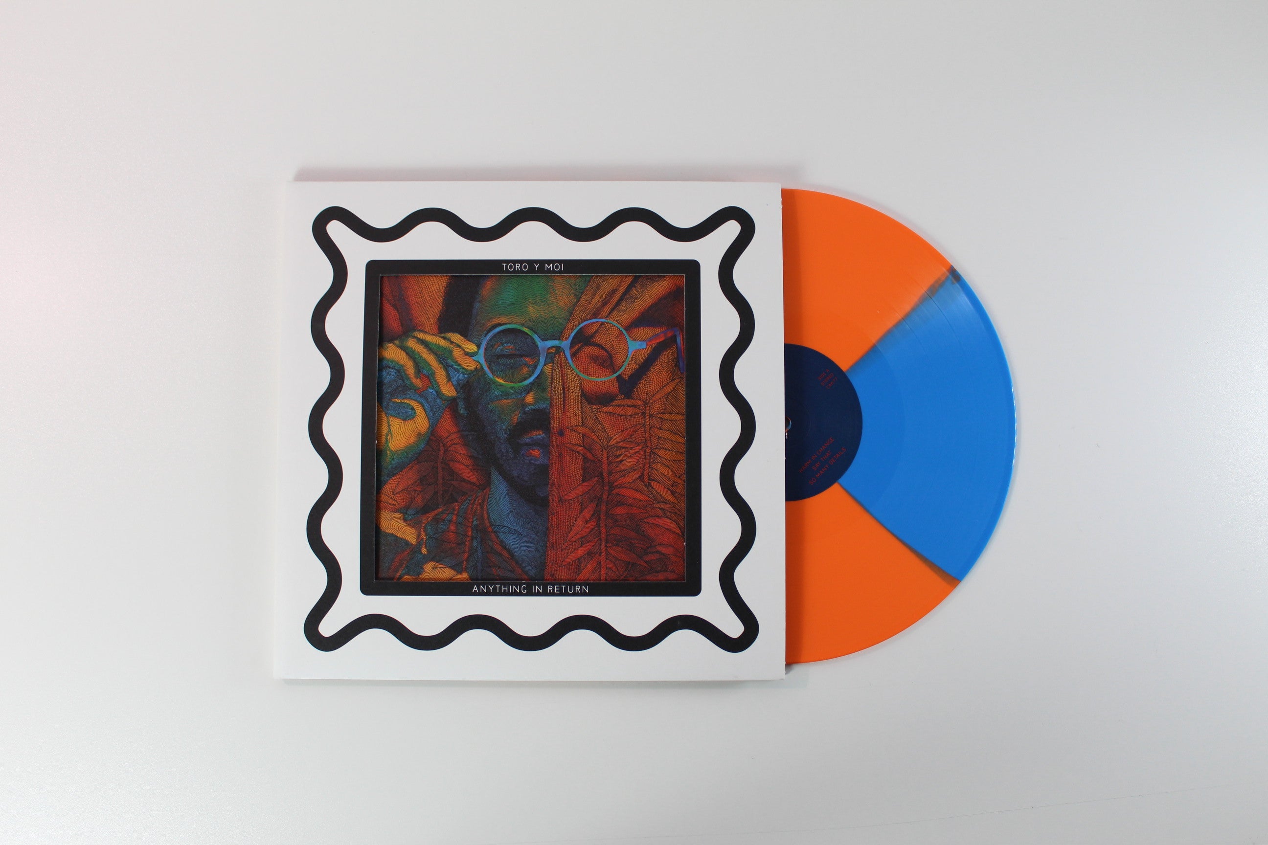 Toro Y Moi - Anything In Return on Carpark Ltd Orange & Blueberry Quad Vinyl Reissue
