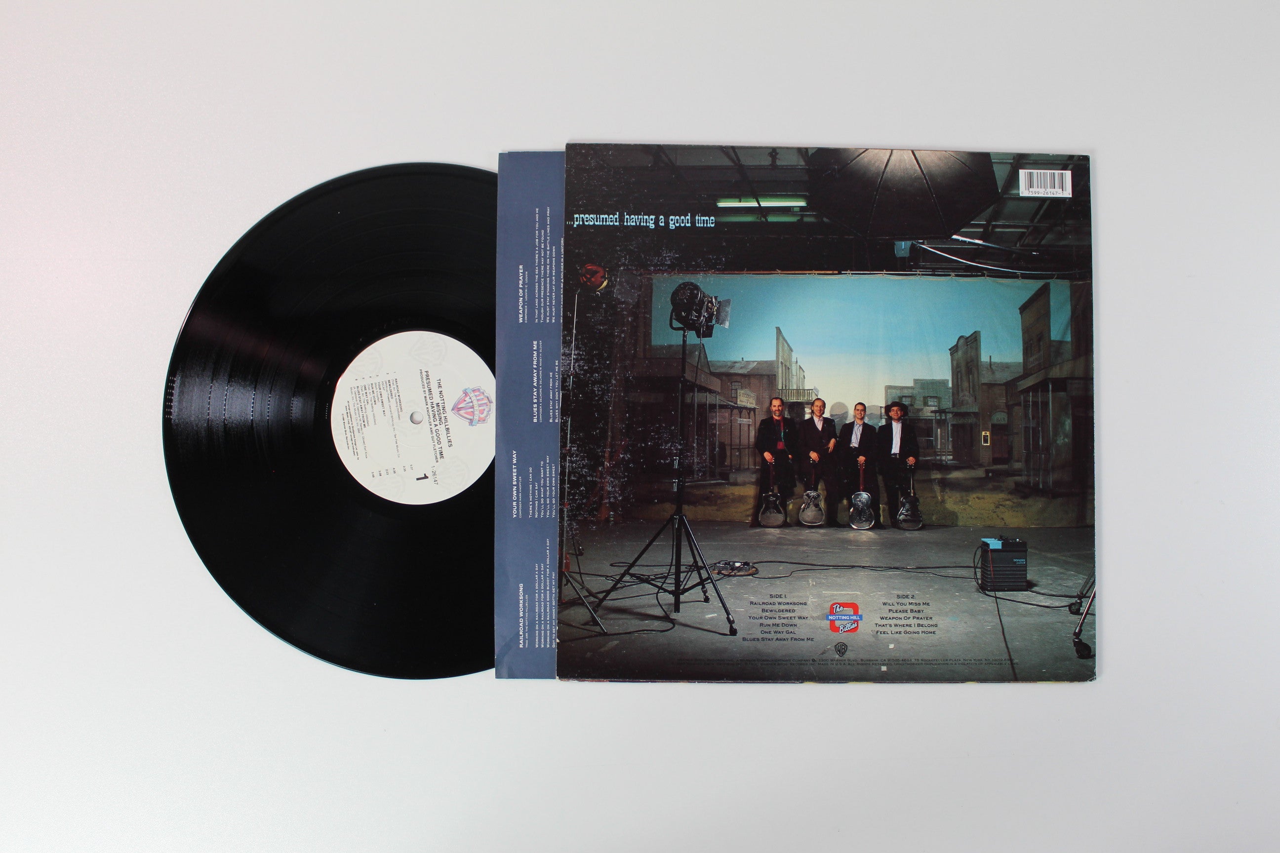 The Notting Hillbillies - Missing... Presumed Having A Good Time on Warner Bros. Records