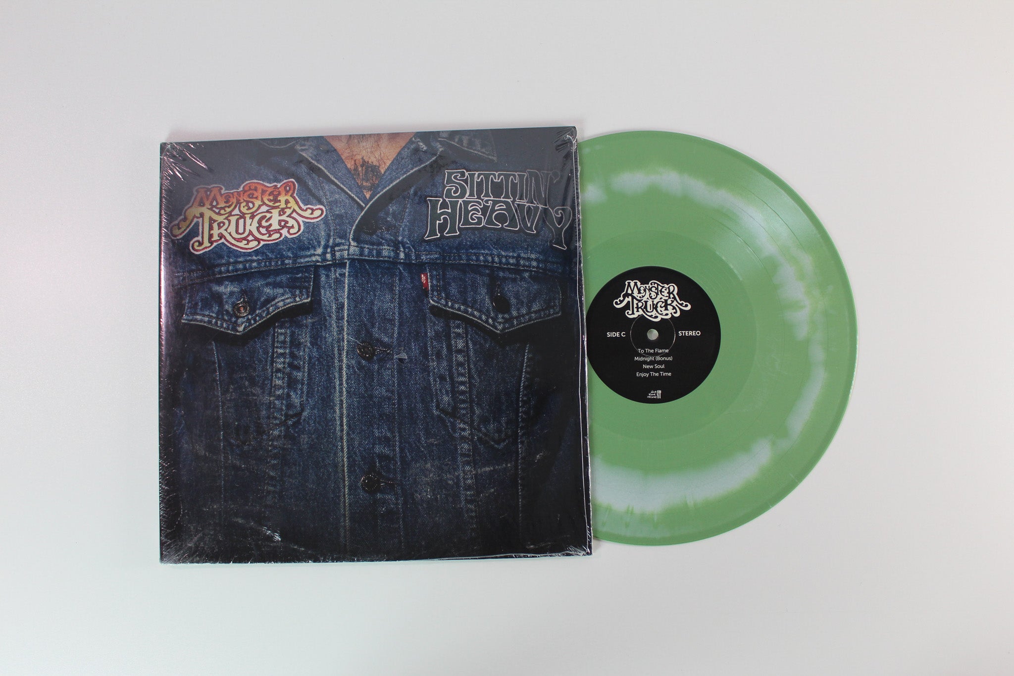 Monster Truck - Sittin' Heavy on Dine Alone Records - Green w/ White Swirl Colored Vinyl