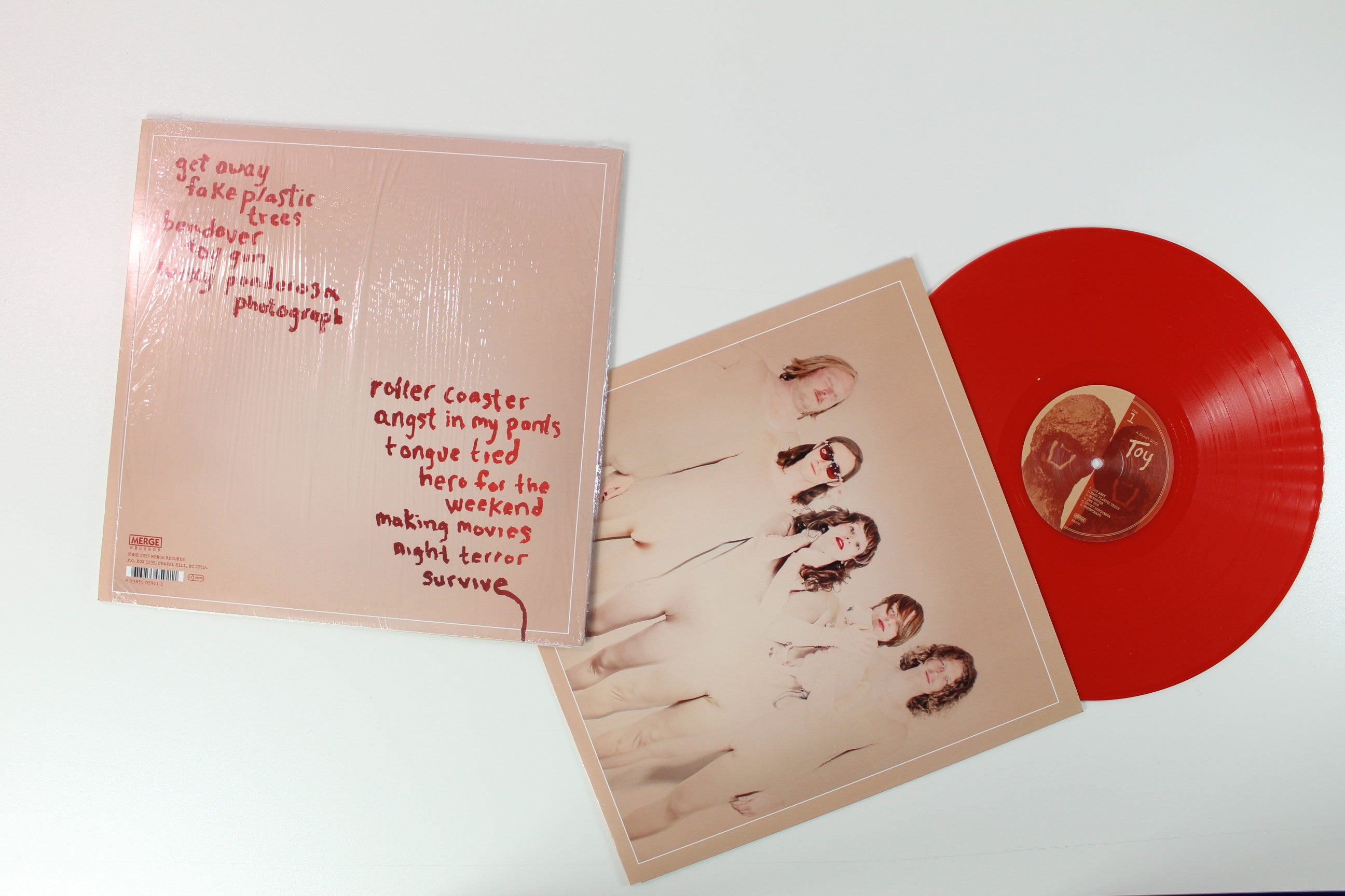 A Giant Dog - Toy on Merge Ltd Lipstick Red