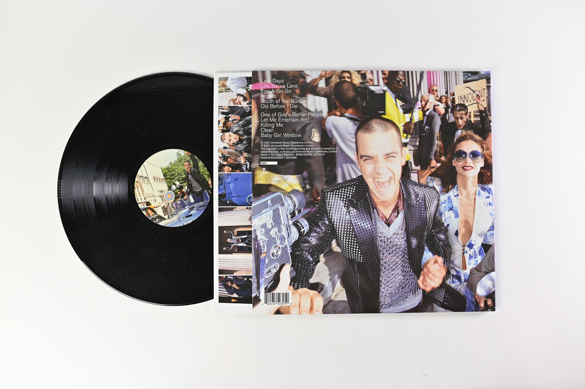 Robbie Williams - Life Thru A Lens on Island Records