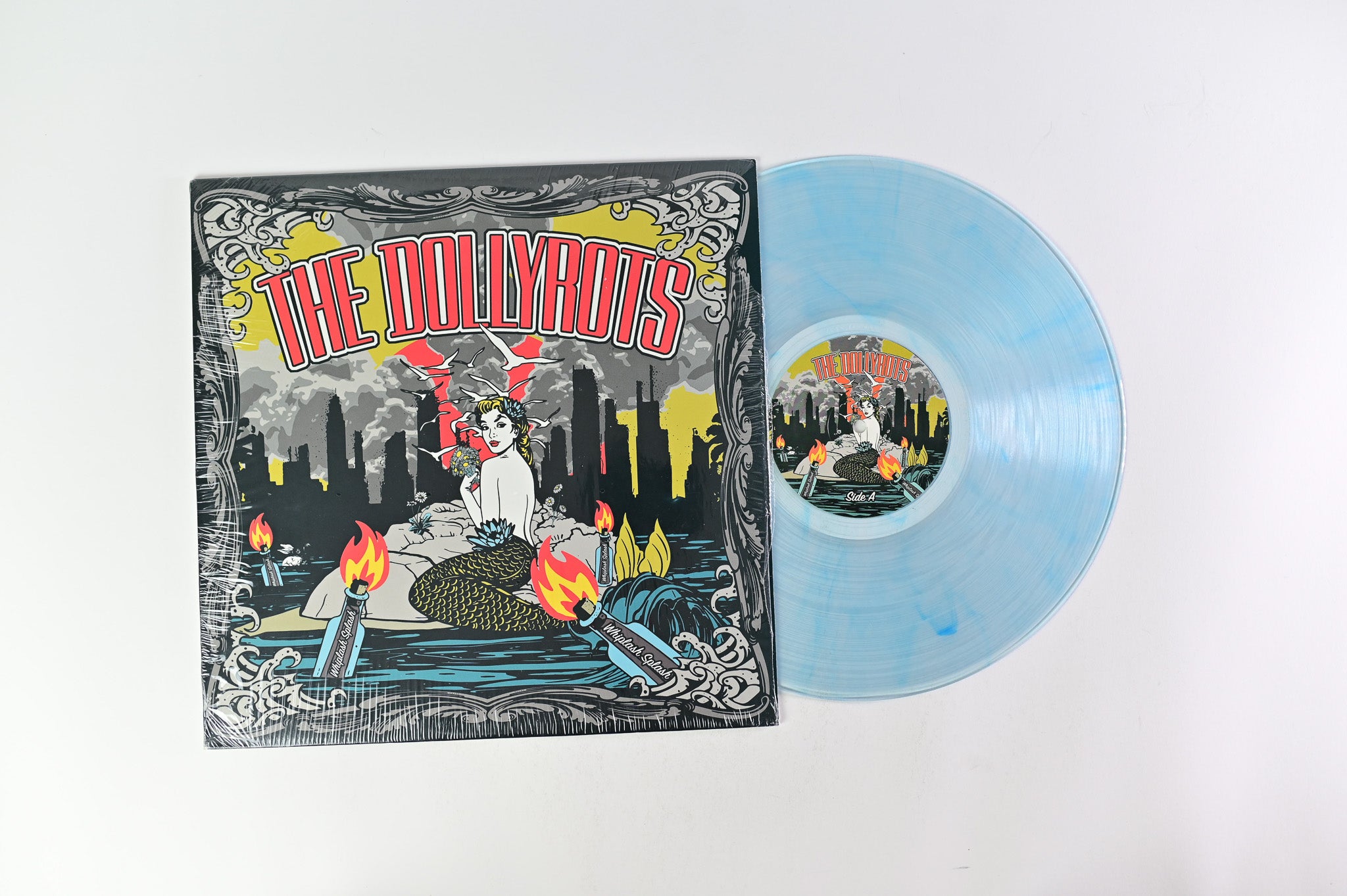 The Dollyrots - Whiplash Splash on Arrested Youth Records - Clear Blue with Blue Swirl Vinyl