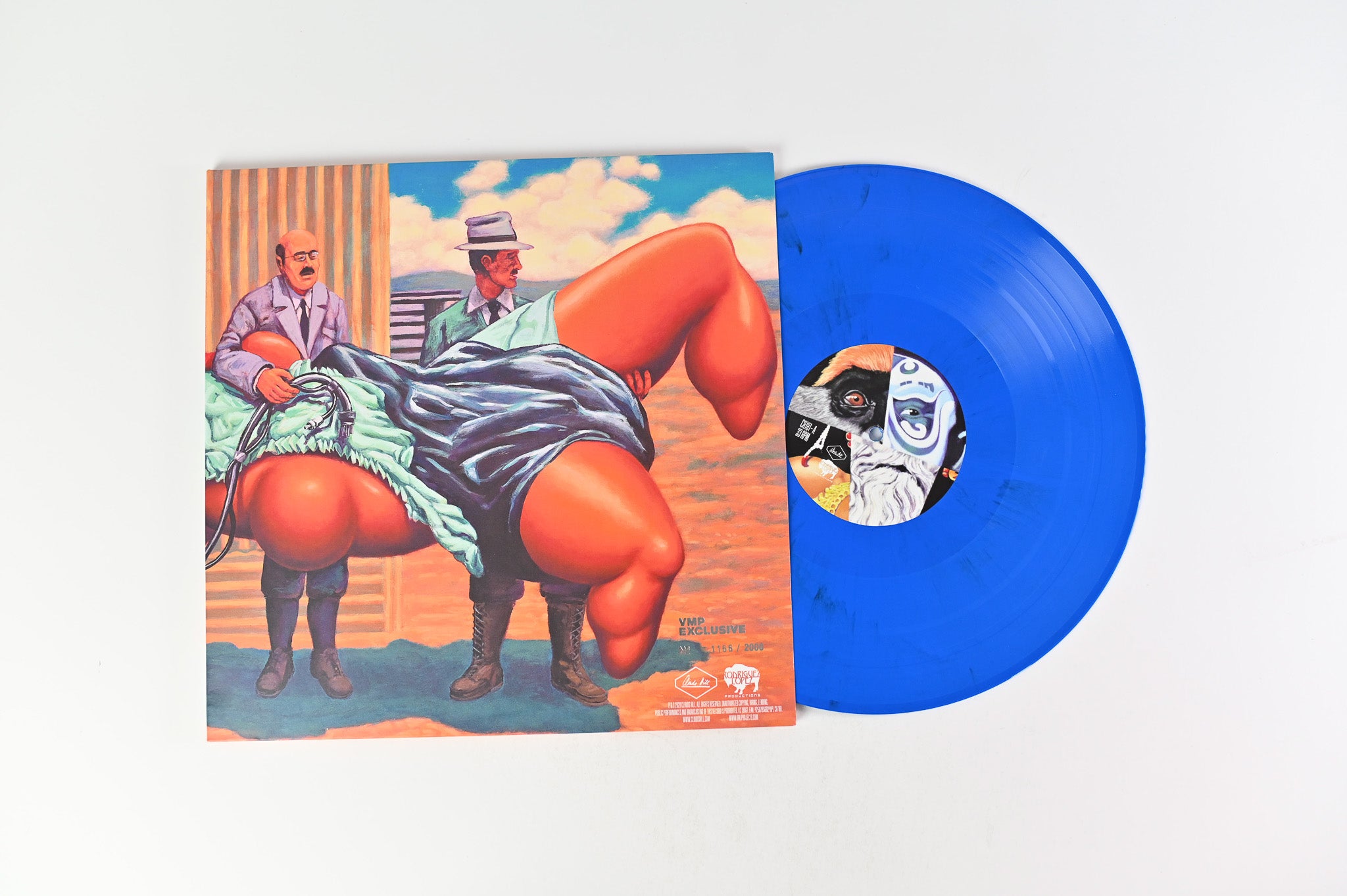 The Mars Volta - Amputechture on Vinyl Me Please Ltd Numbered Blue / Orange Marble Reissue