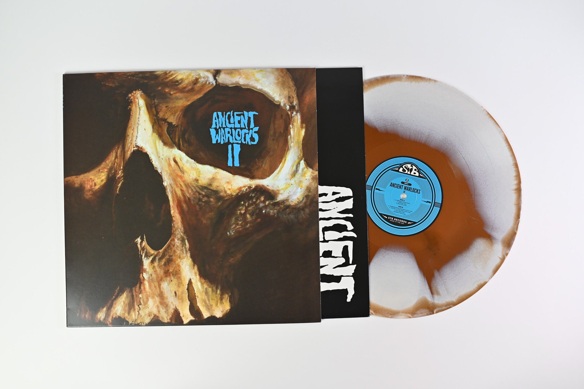 Ancient Warlocks - II on STB Ltd Gold And White Marbled Translucent
