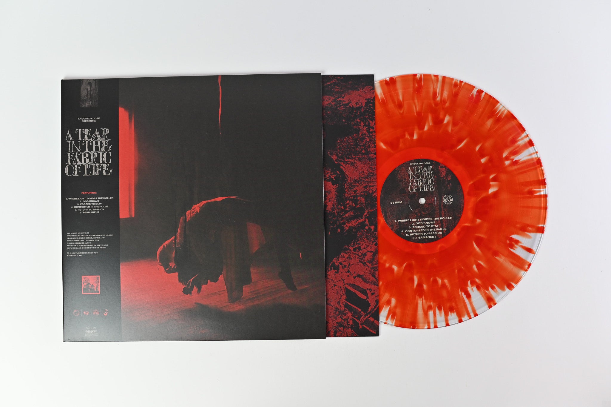 Knocked Loose - A Tear In The Fabric Of Life on Pure Noise Red / Clear Splatter