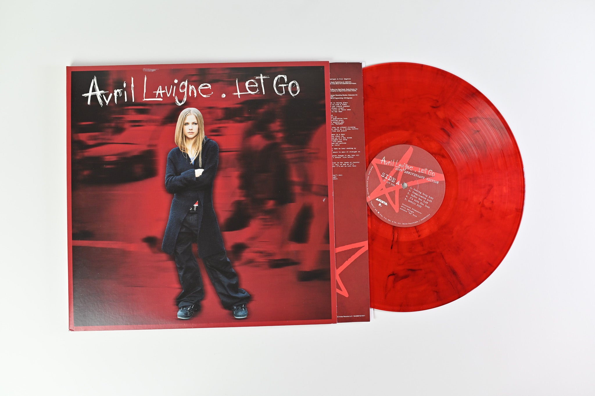 Avril Lavigne - Let Go on Legacy Arista Ltd Red Smoke Reissue