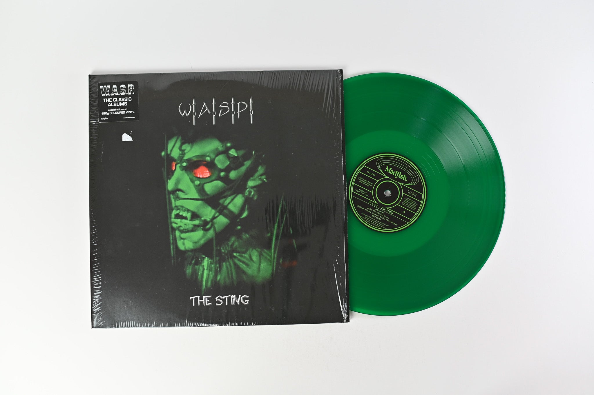 W.A.S.P. - The Sting on Madfish Green Transparent