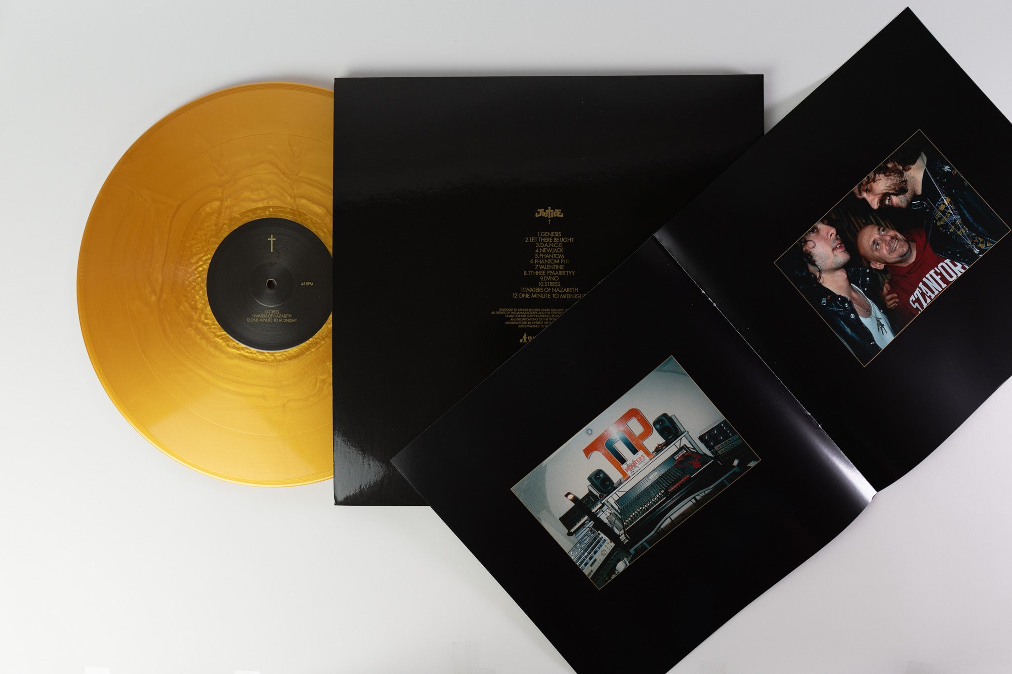 Justice - † on Vinyl Me Please Gold Nugget Vinyl Reissue