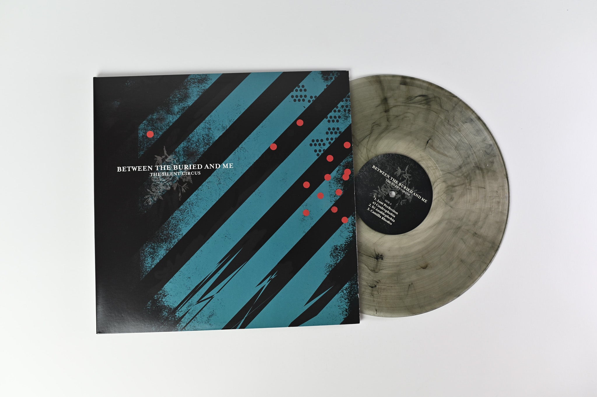 Between The Buried And Me - The Silent Circus on Victory Ltd Clear Black Smoke Repress