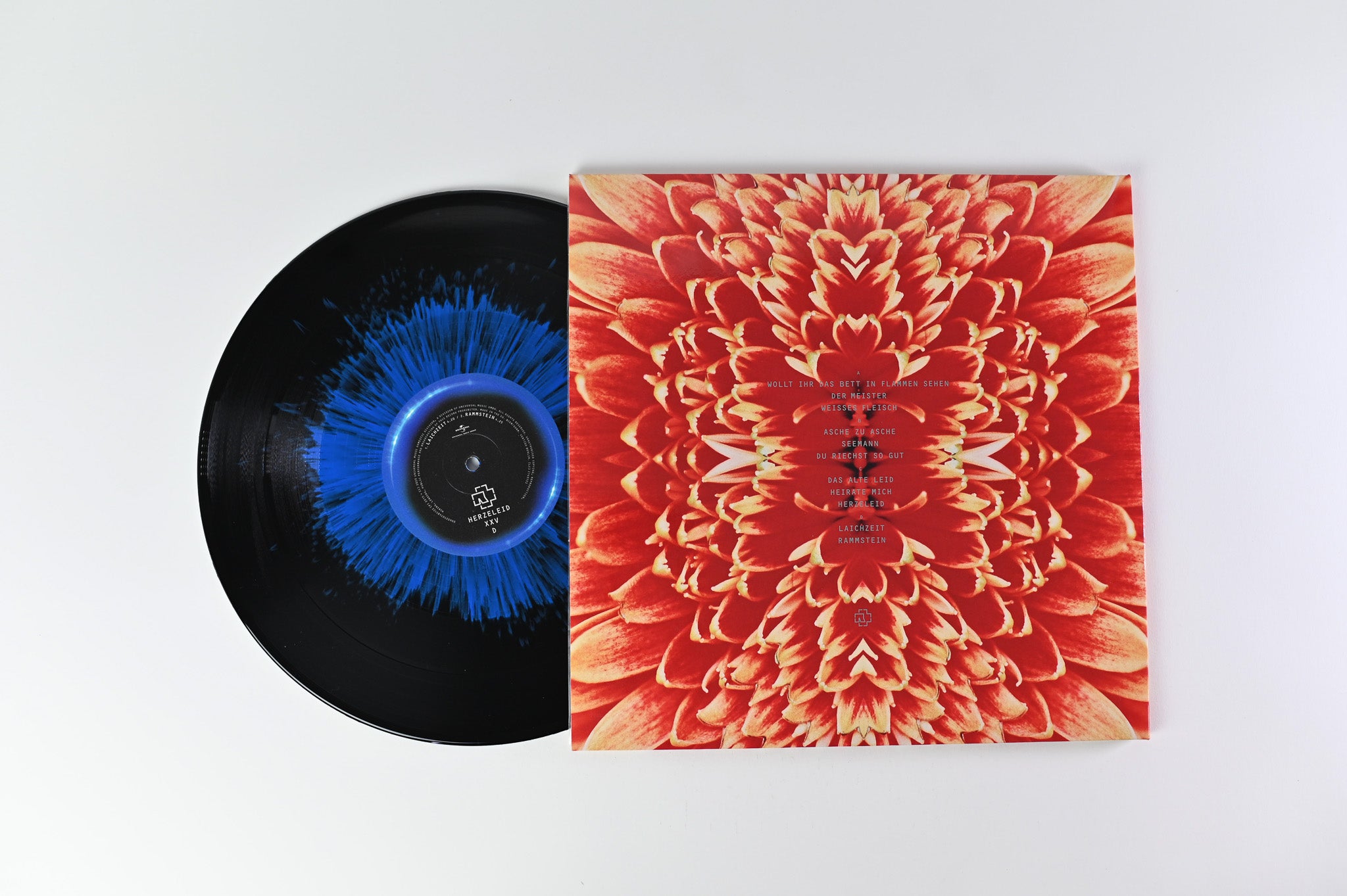 Rammstein - Herzeleid XXV on Universal Ltd Blue & Black Splatter Reiss