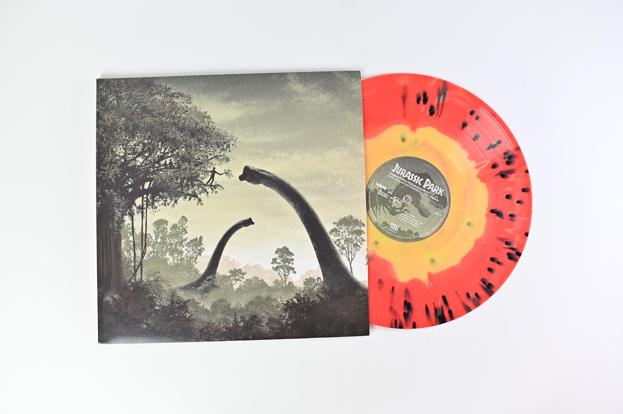 John Williams - Jurassic Park (Original Motion Picture Soundtrack) on Mondo Ltd Yellow and Red Swirl with Black Splatter 180 Gram Reissue