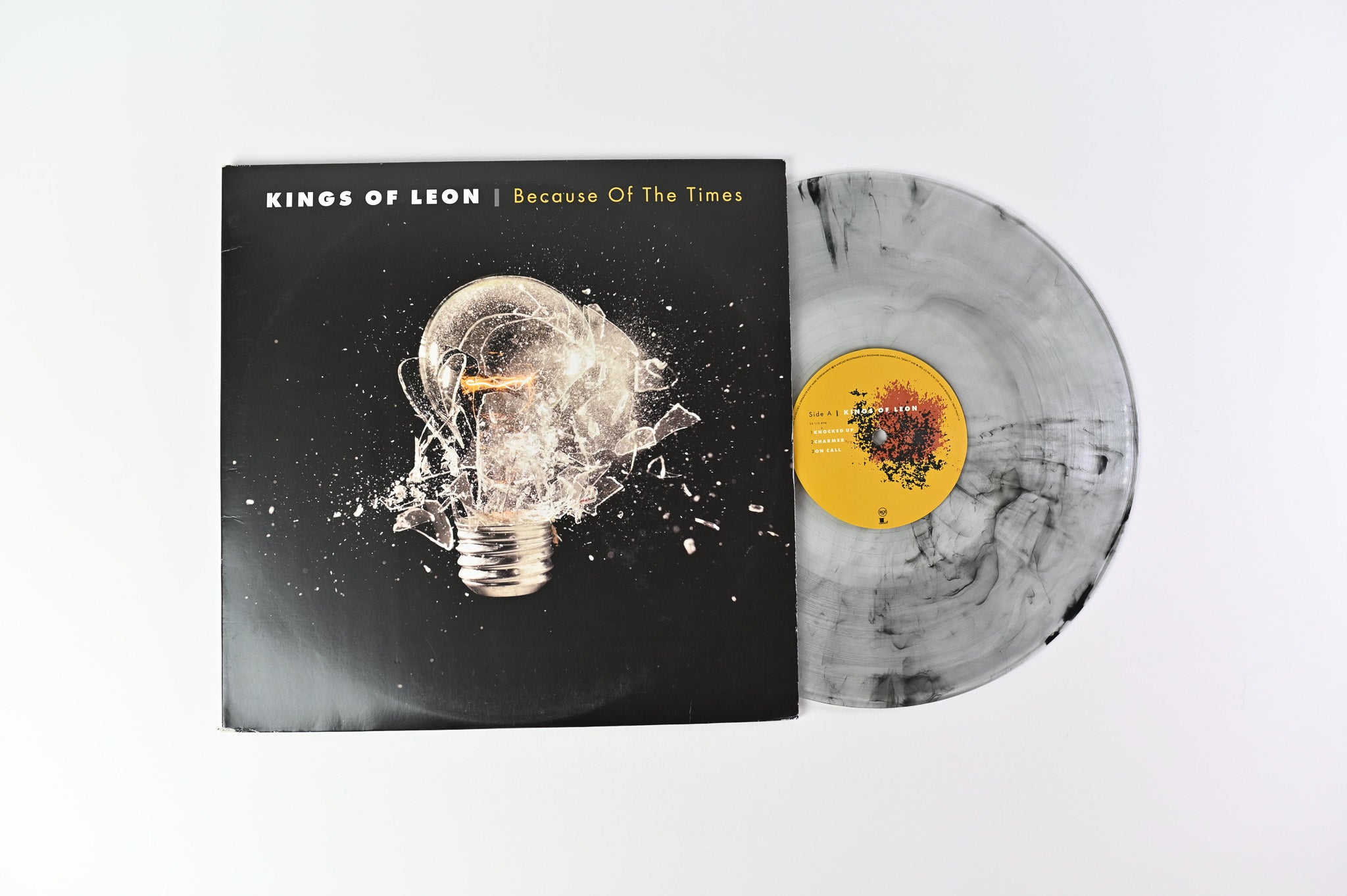 Kings Of Leon - Because Of The Times on RCA Legacy Ltd Numbered Clear w/ Smokey White Swirl Reissue