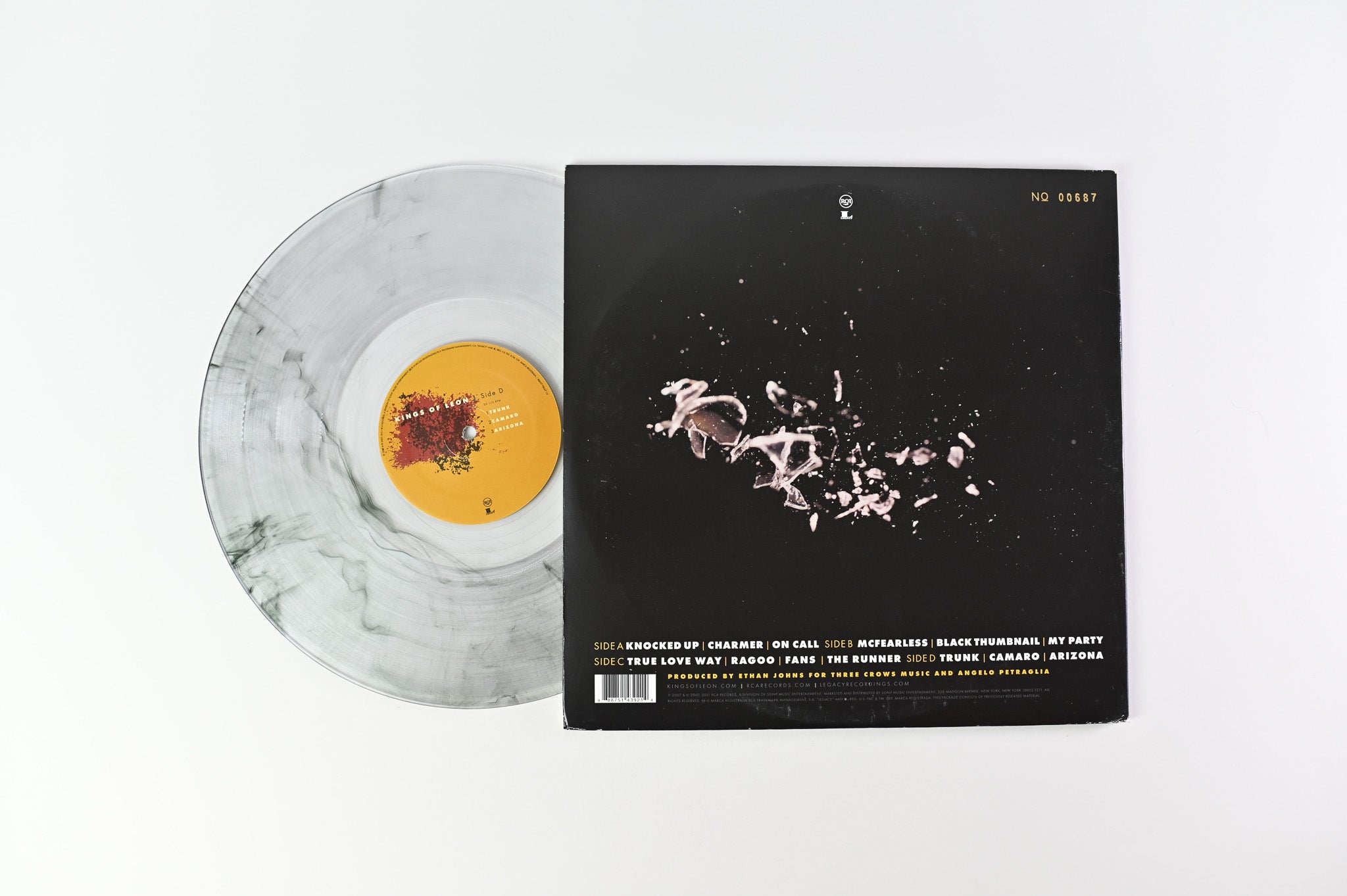 Kings Of Leon - Because Of The Times on RCA Legacy Ltd Numbered Clear w/ Smokey White Swirl Reissue
