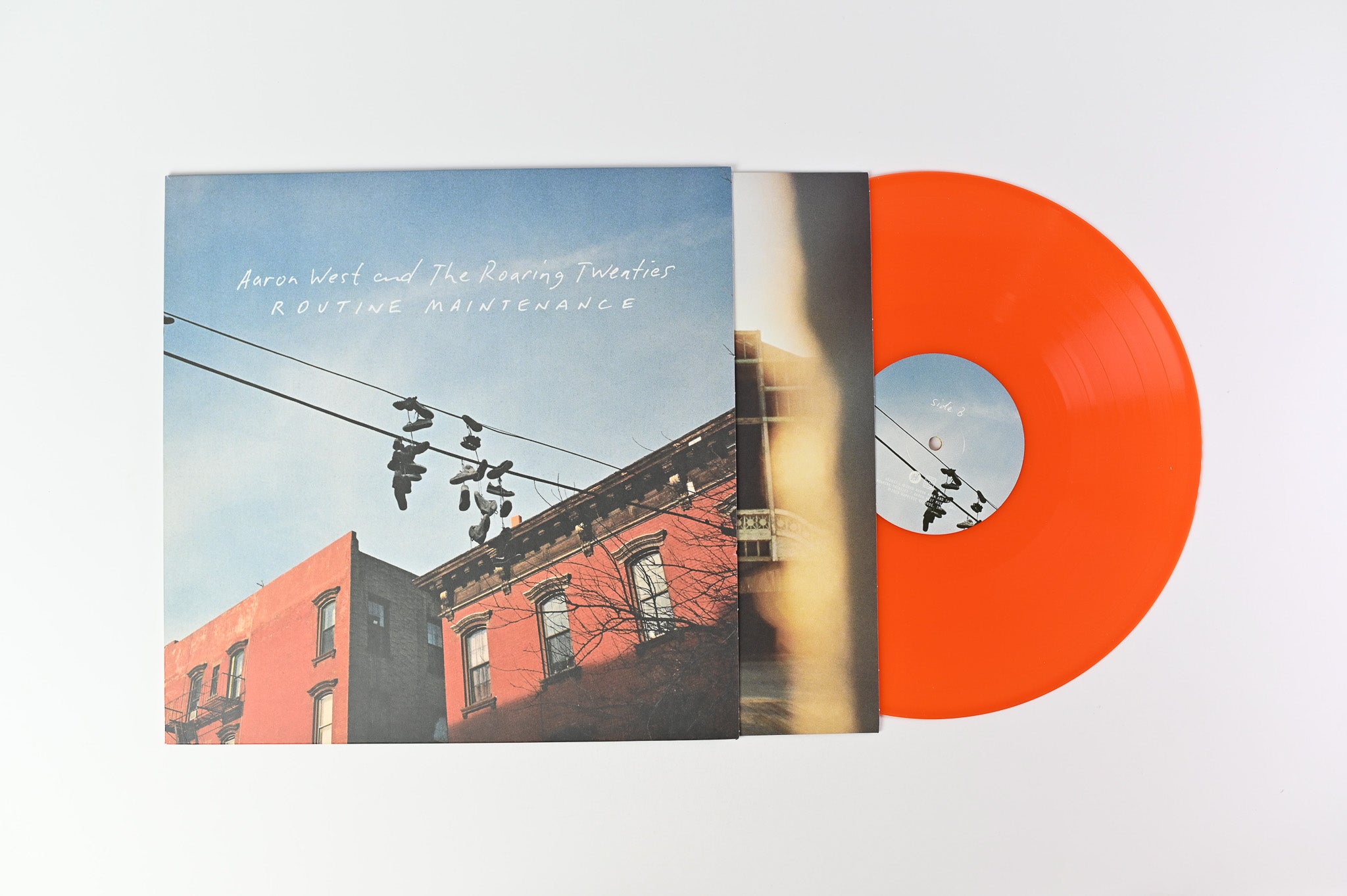 Aaron West And The Roaring Twenties - Routine Maintenance on Hopeless Records Orange Vinyl