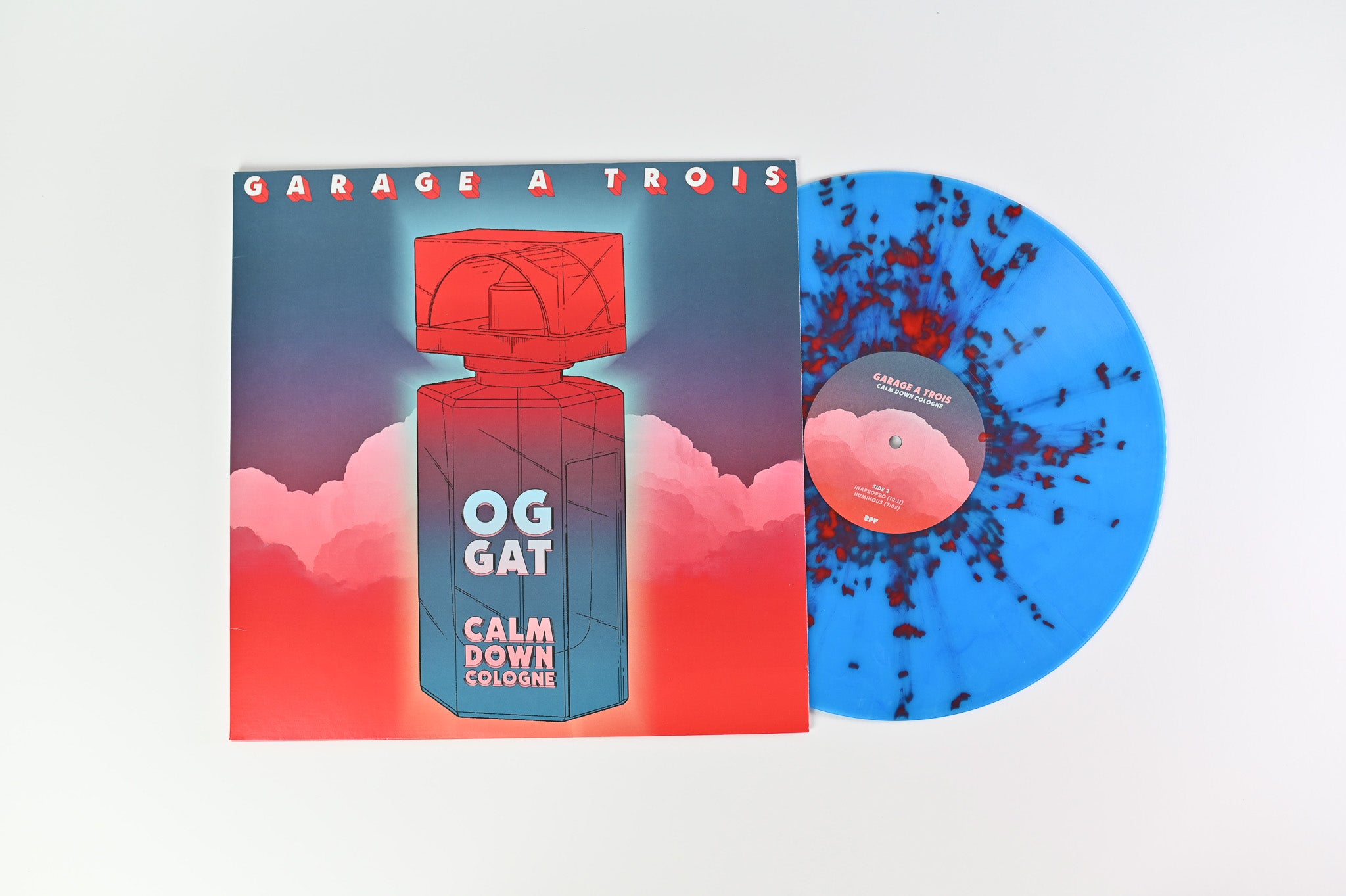 Garage A Trois - Calm Down Cologne on Royal Potato Family Ltd Blue & Red 3D Splatter Vinyl
