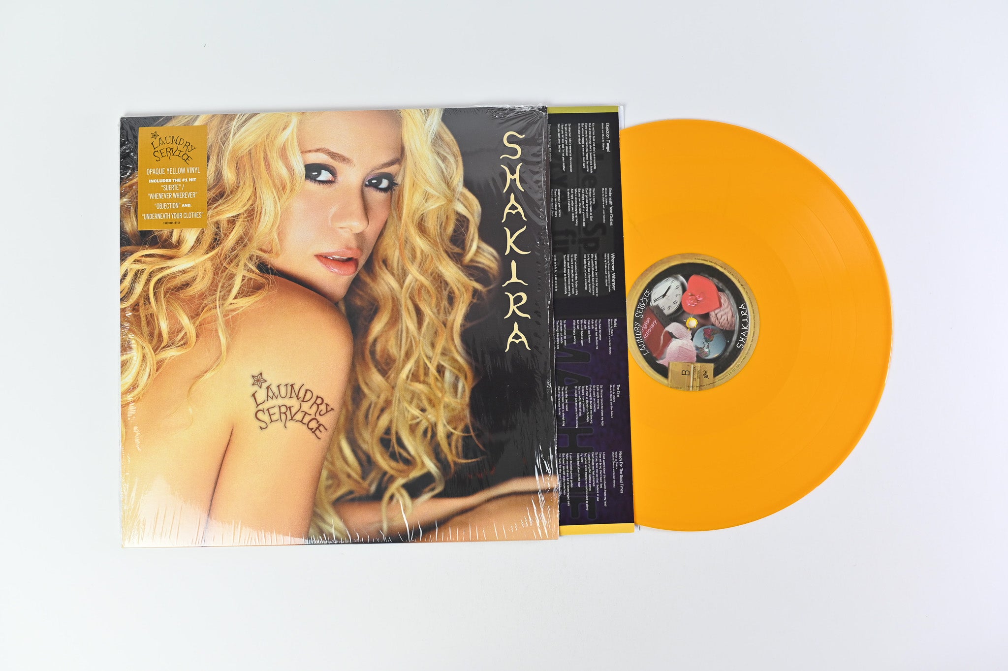 Shakira - Laundry Service on Epic Yellow Opaque Reissue