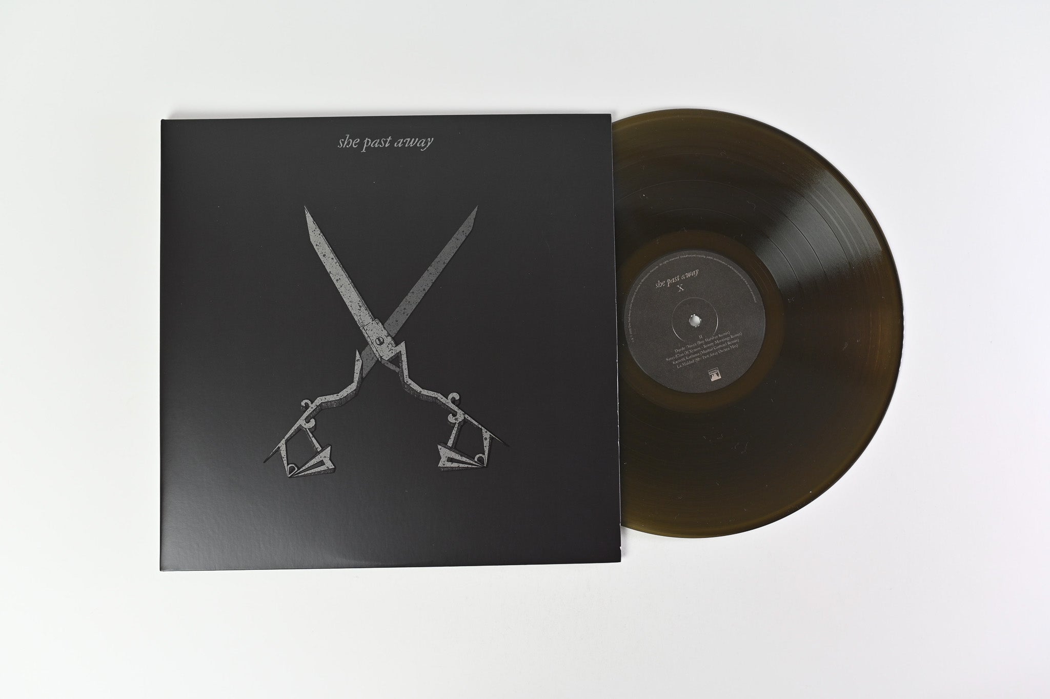 She Past Away - X on Metropolis Ltd Dark Clear Vinyl