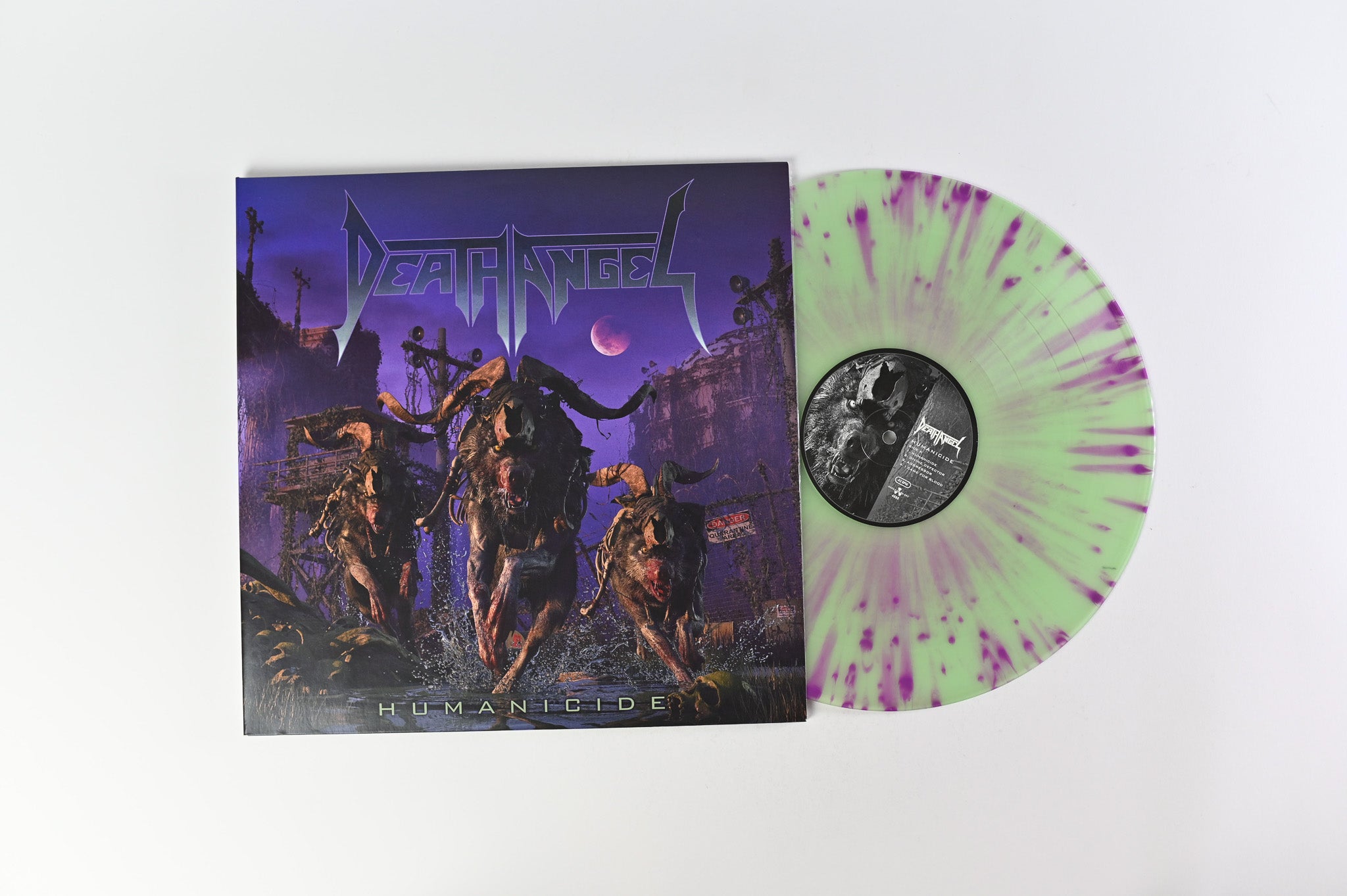Death Angel - Humanicide on Nuclear Blast Ltd Green w/ Purple Splatter Reissue