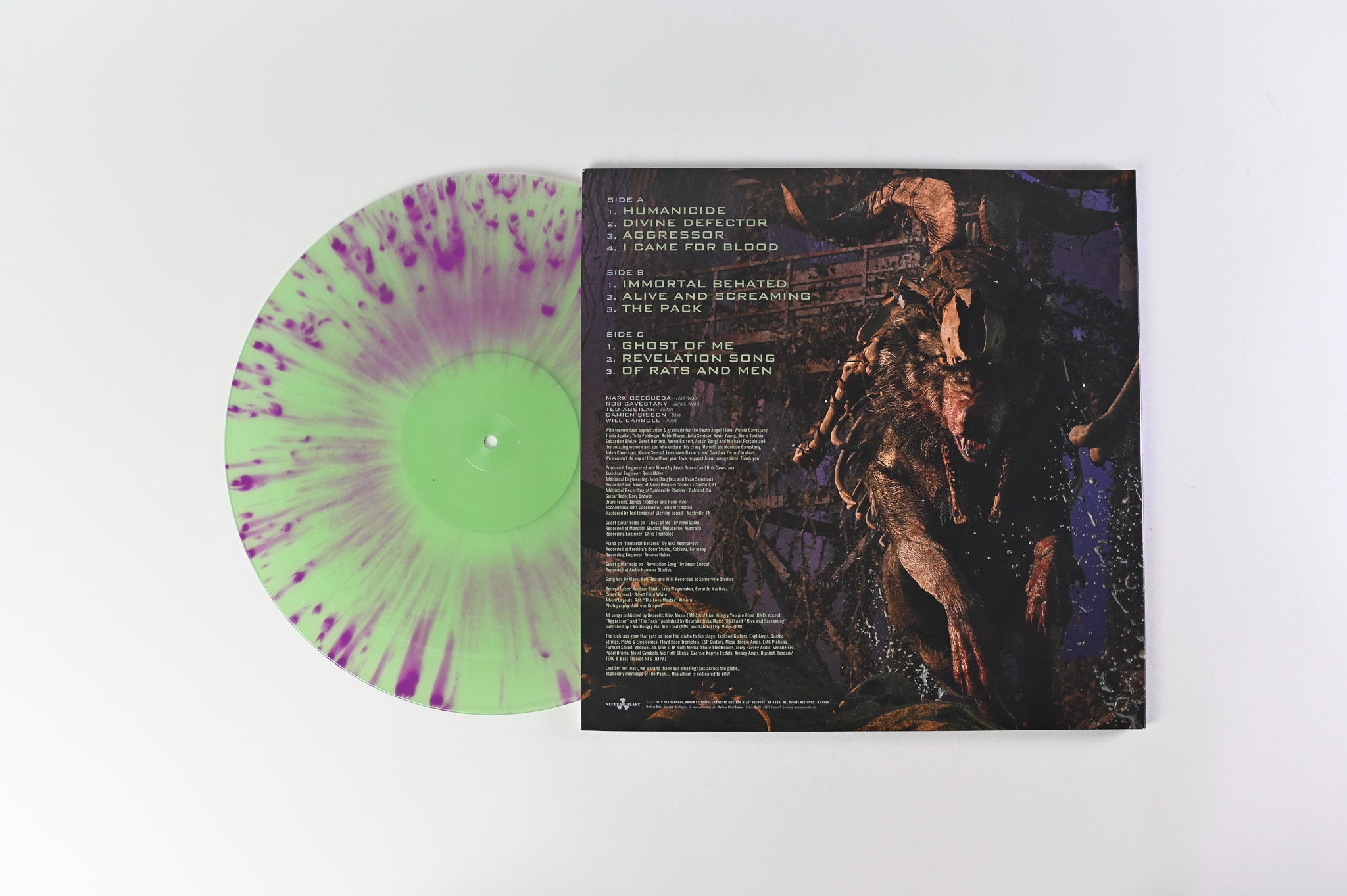 Death Angel - Humanicide on Nuclear Blast Ltd Green w/ Purple Splatter Reissue