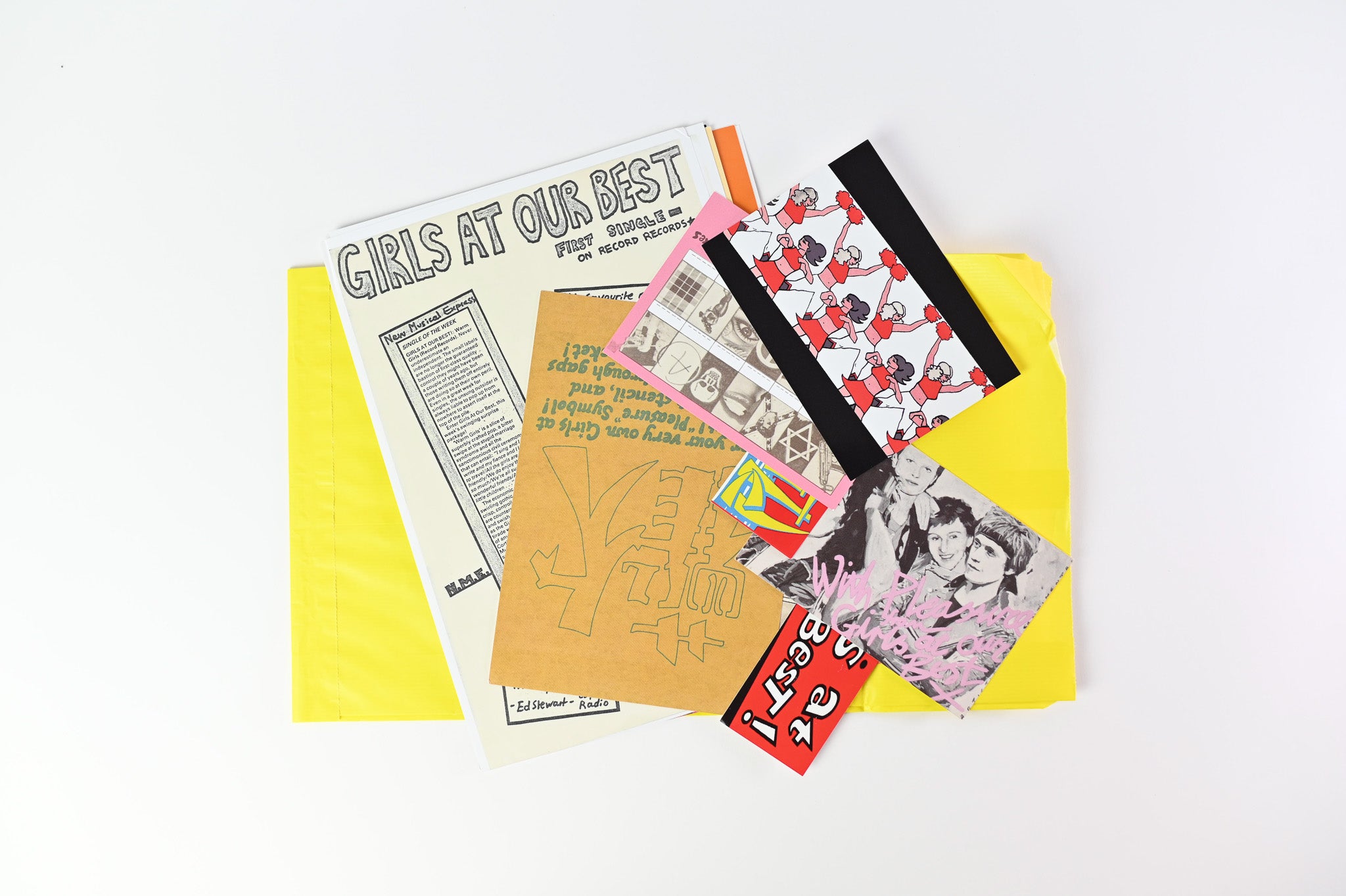 Girls At Our Best - Pleasure on Optic Nerve Numbered Yellow Clear Splatter Reissue