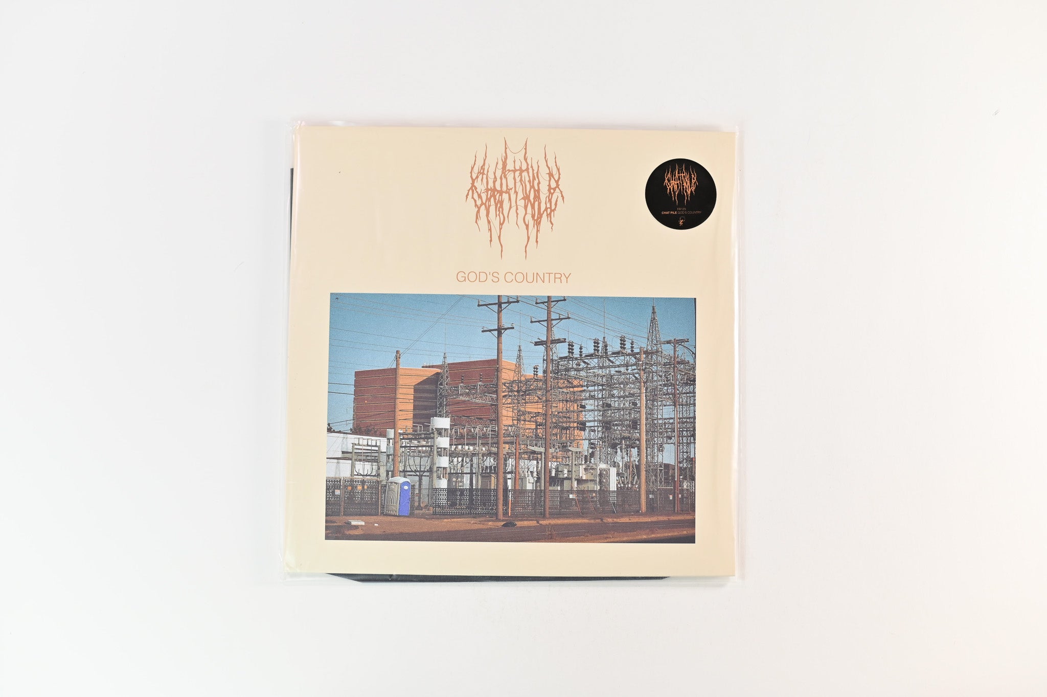 Chat Pile - God's Country on Flenser Ltd Milky Clear w/ Black / Blue & Orange Splatter