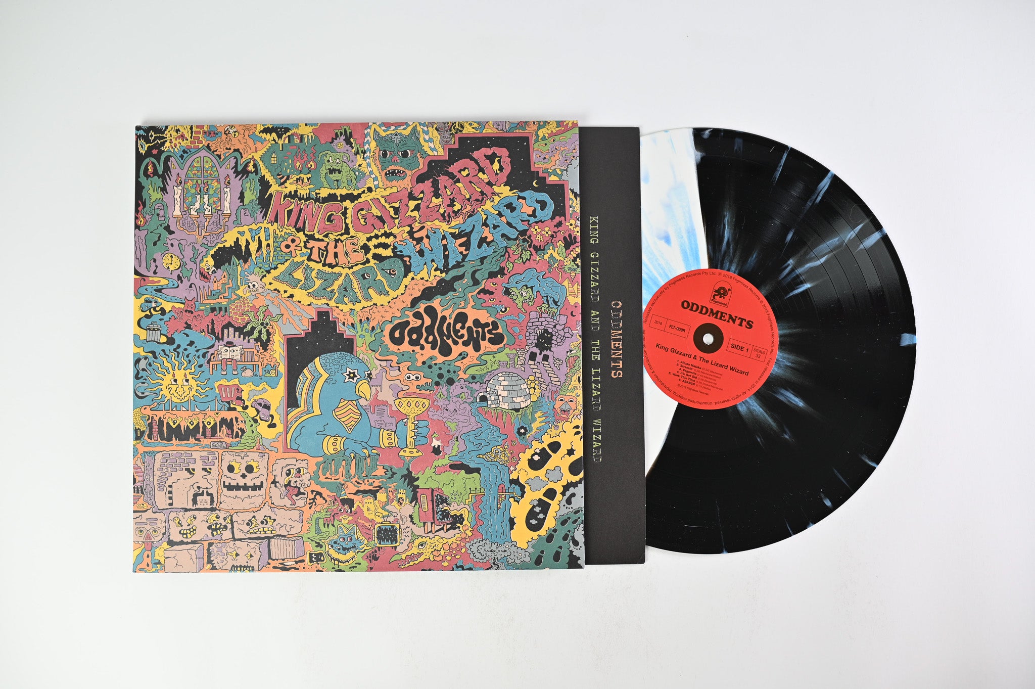 King Gizzard And The Lizard Wizard - Oddments on Flightless - Black & White Split With Cyan Blue Splatter