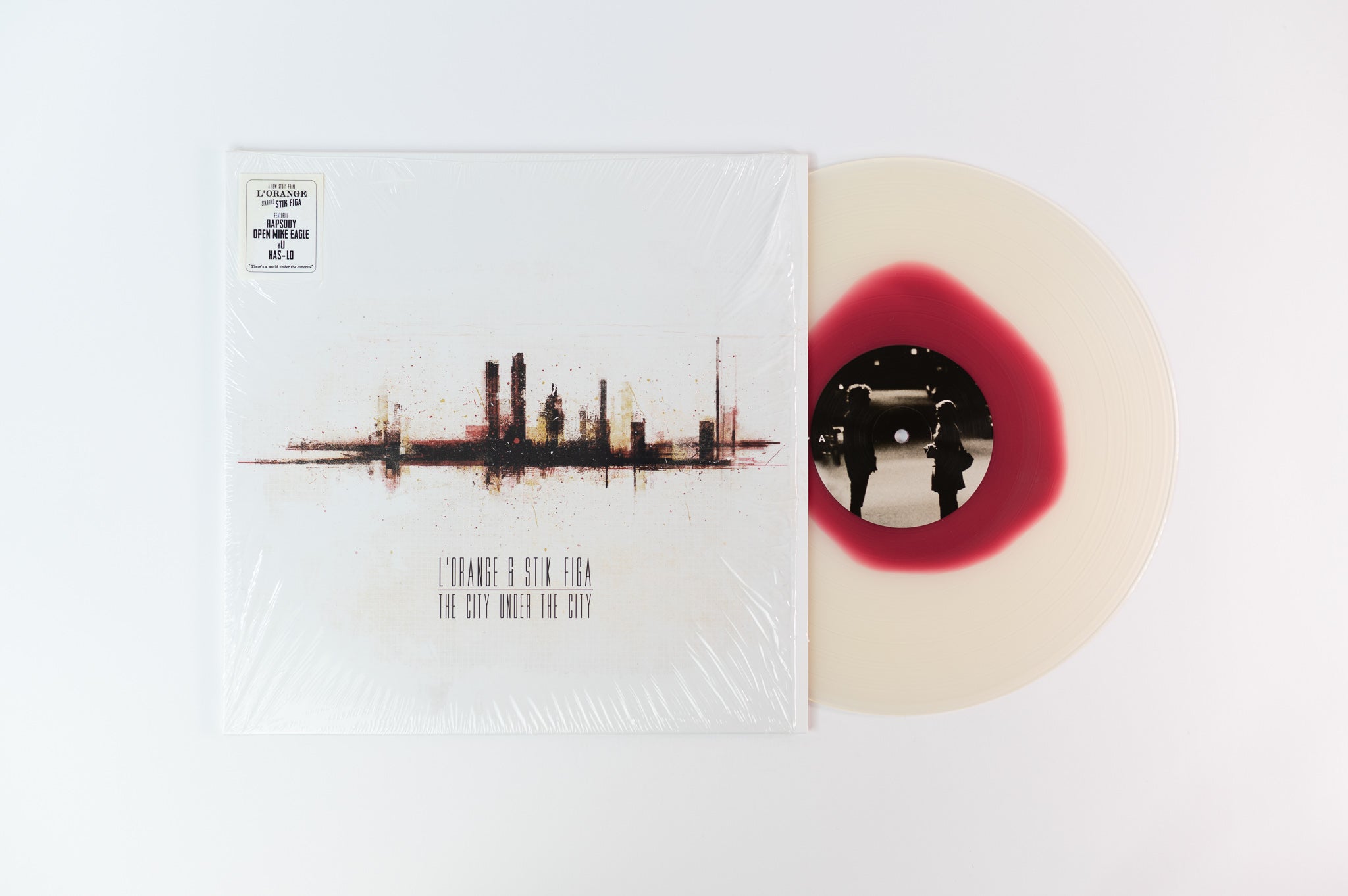 L'Orange & Stik Figa - The City Under The City on Mello Music Group Limited Clear With Pink Drop Vinyl