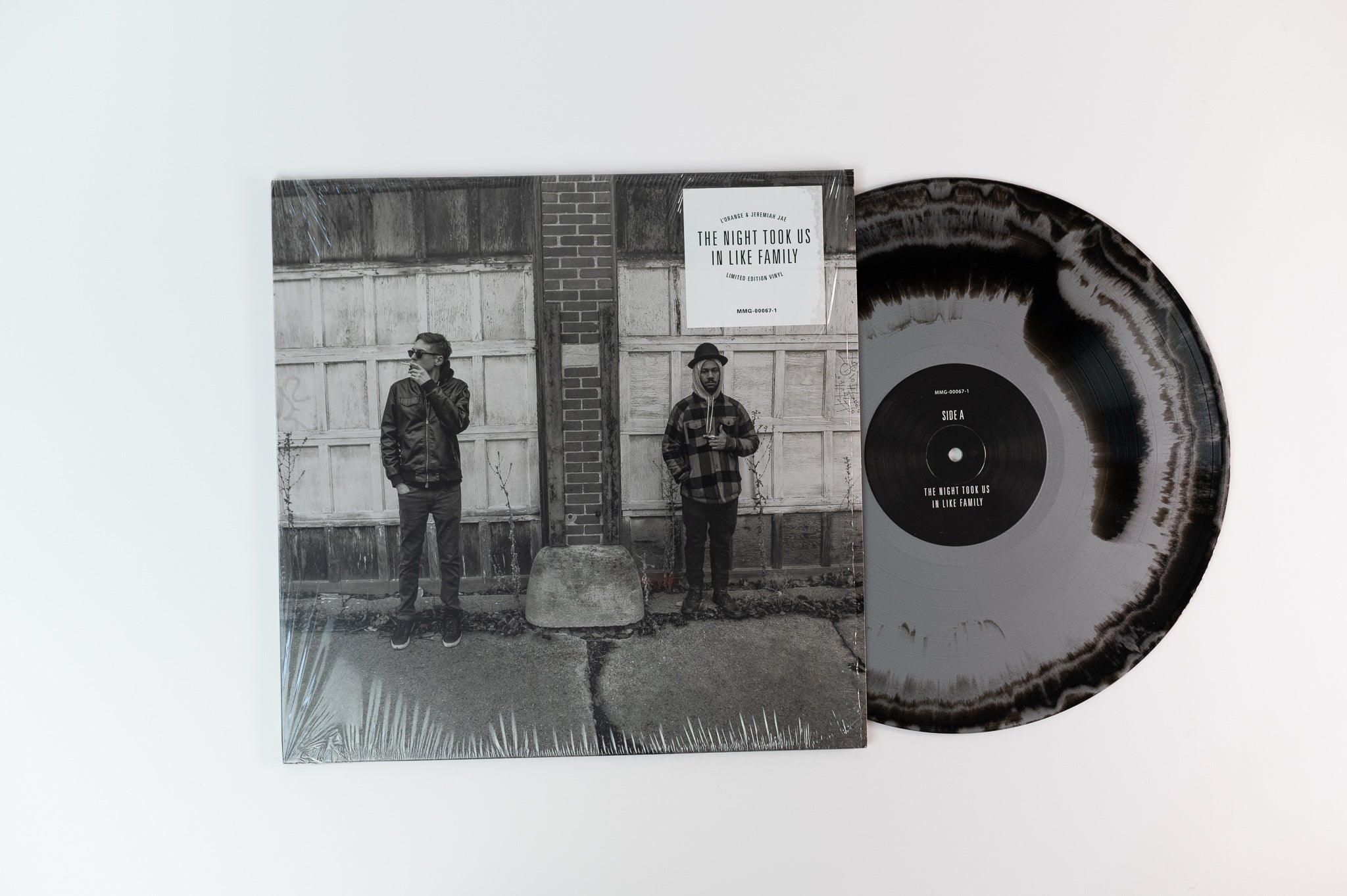 L'Orange & Jeremiah Jae - The Night Took Us In Like Family on Mello Music Silver and Black Vinyl Reissue