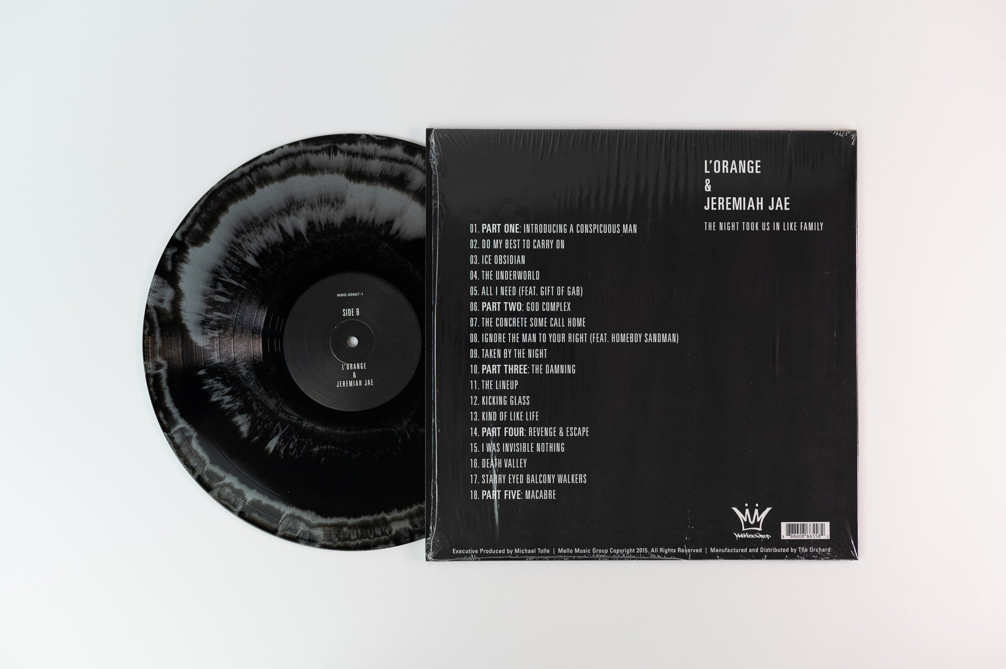 L'Orange & Jeremiah Jae - The Night Took Us In Like Family on Mello Music Silver and Black Vinyl Reissue