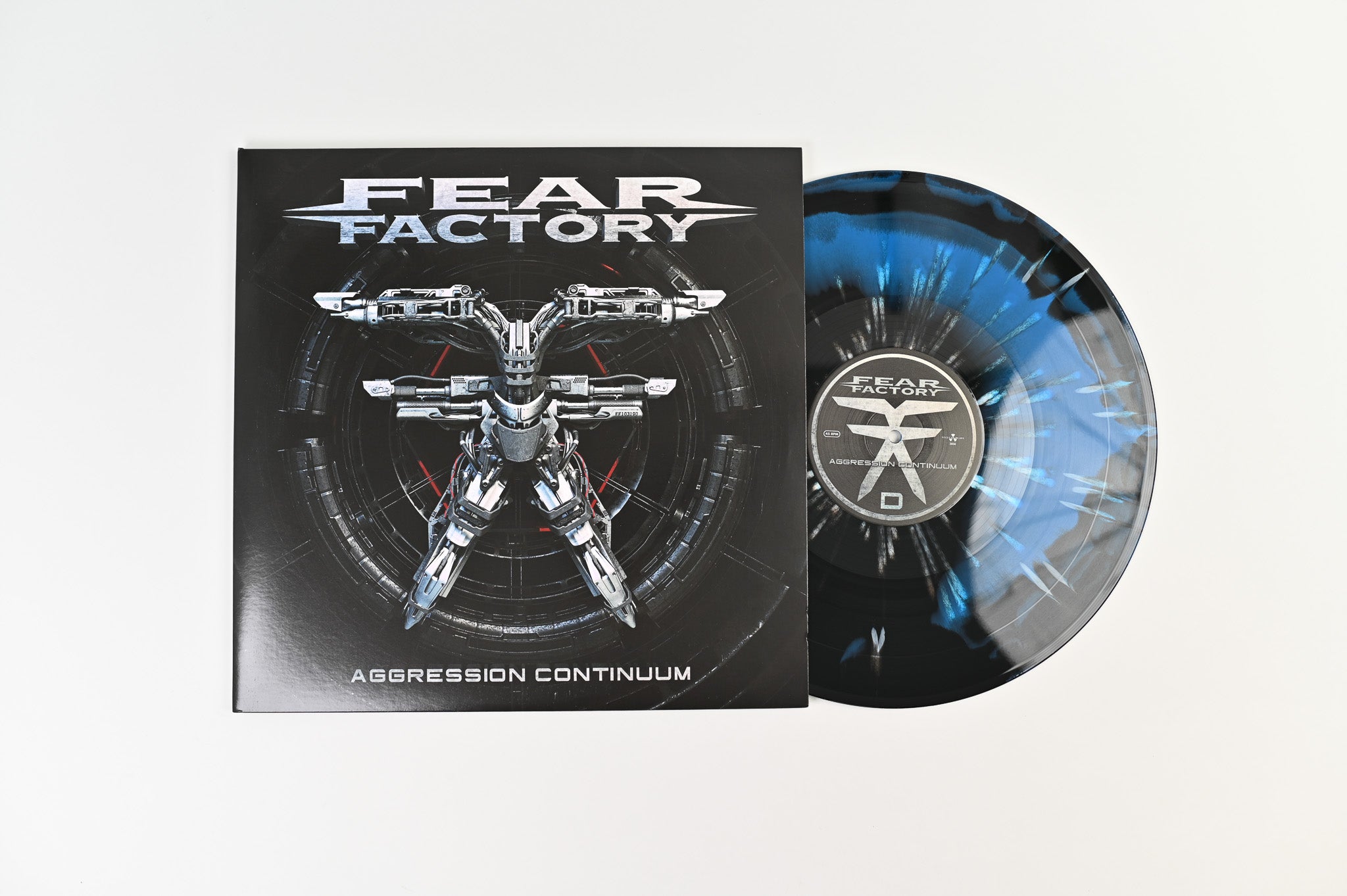 Fear Factory - Aggression Continuum on Nuclear Blast Ltd Black & Blue with White Splatter