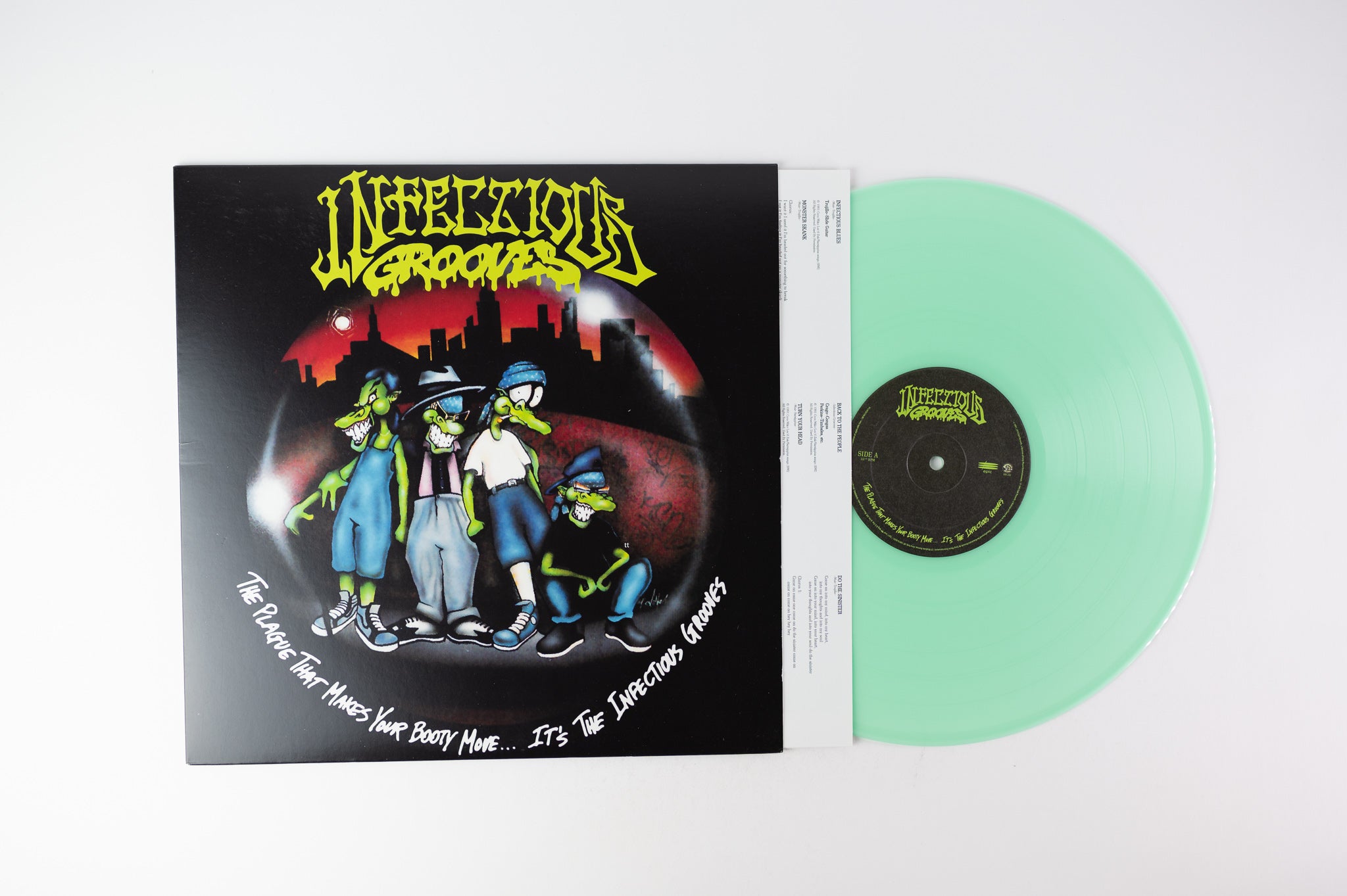 Infectious Grooves - The Plague That Makes Your Booty Move... It's The Infectious Grooves on Brookvale Epic Sony Limited Glow In The Dark Vinyl Reissue