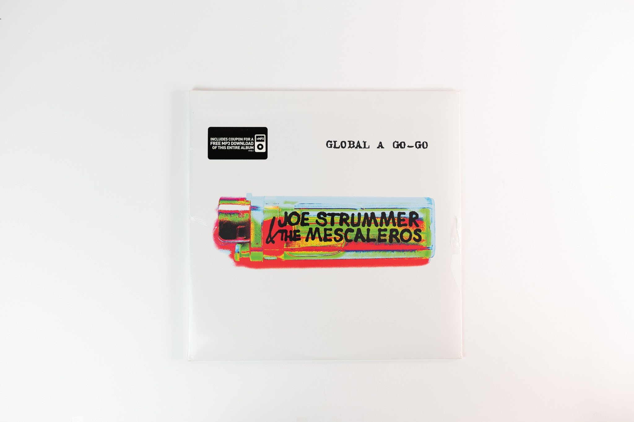 Joe Strummer & The Mescaleros - Global A Go-Go on Hellcat Records - Se